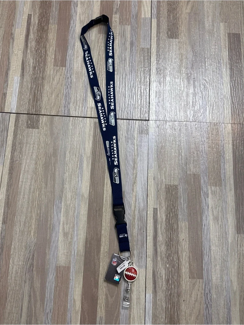 NFL Seattle Seahawks Navy Lanyard with Red Football Badge Reel NWT